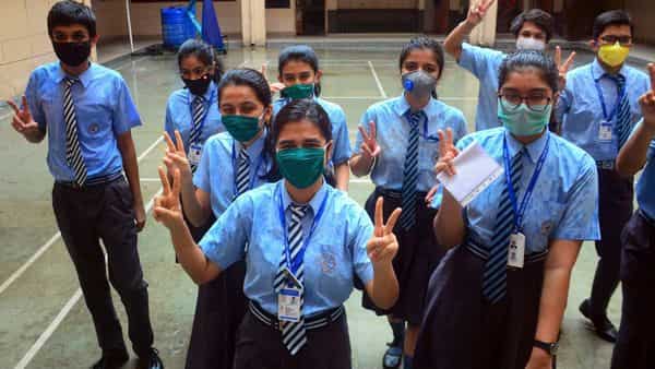 Students flash the victory sign after CBSE announced class 12 results. (File Photo) (PTI)